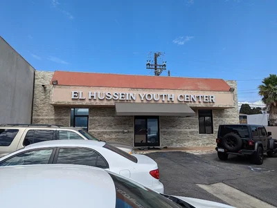 El Hussein Youth Center Mosque • Masjid logo